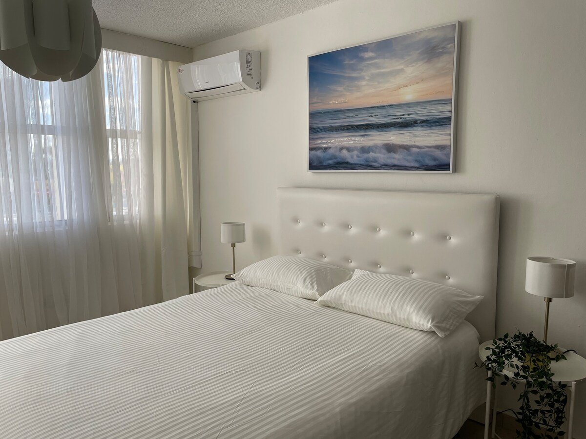 度假村风格的海滨公寓，提供24小时安保服务