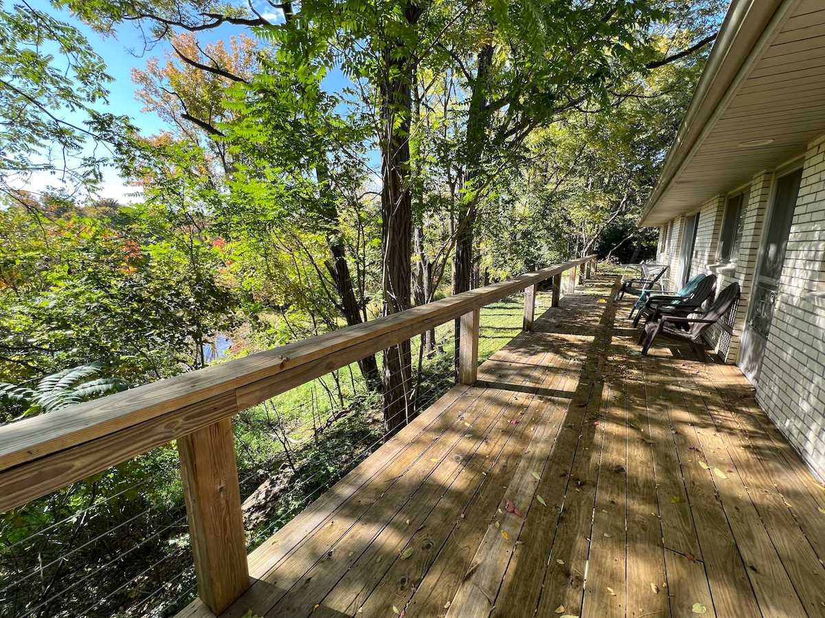 Riverfront mid-century home surrounded by nature!