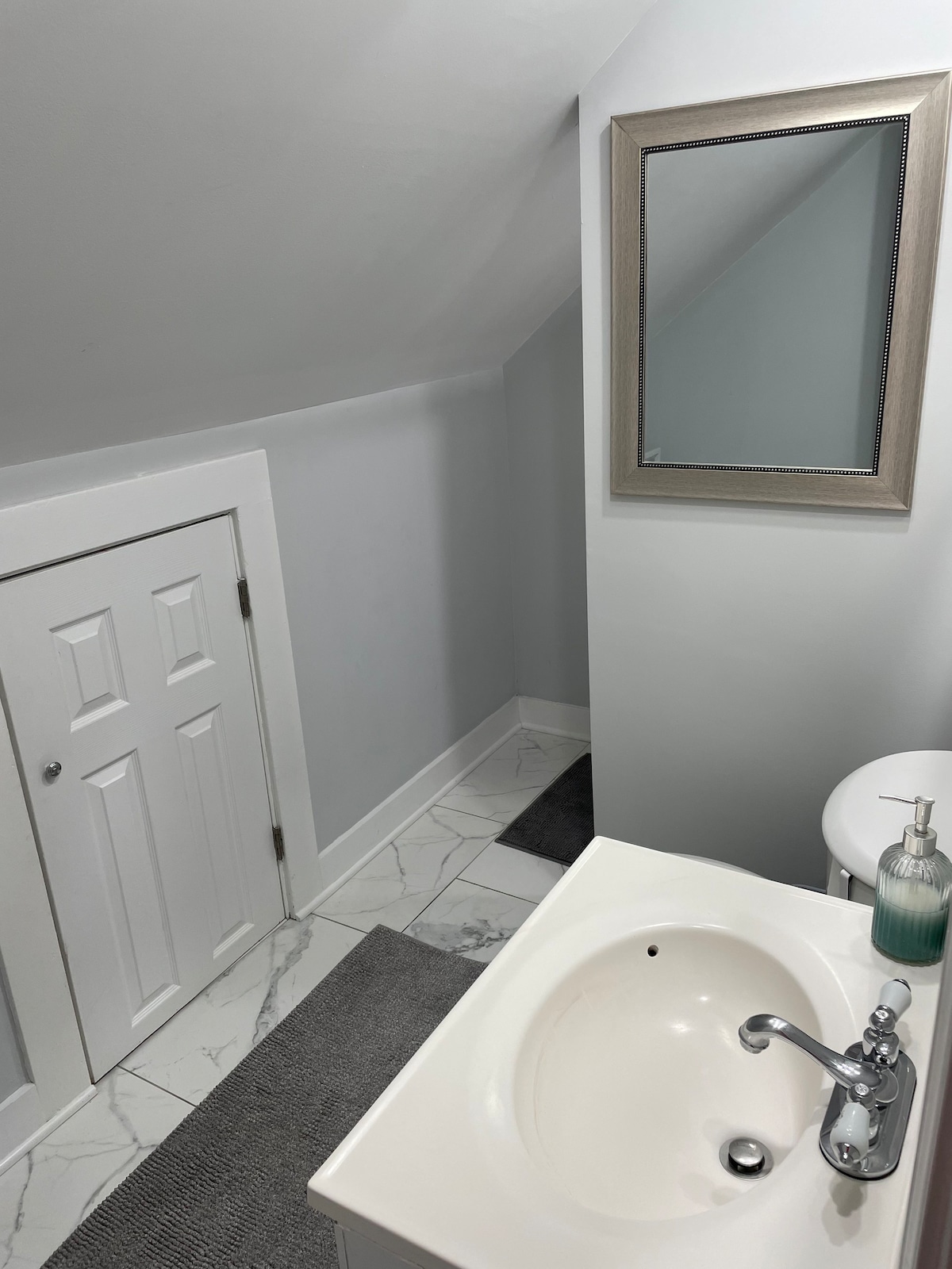 Bedroom and private bathroom with laundry/parking