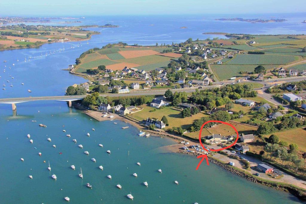 Maison de pêcheur les pieds dans l'eau