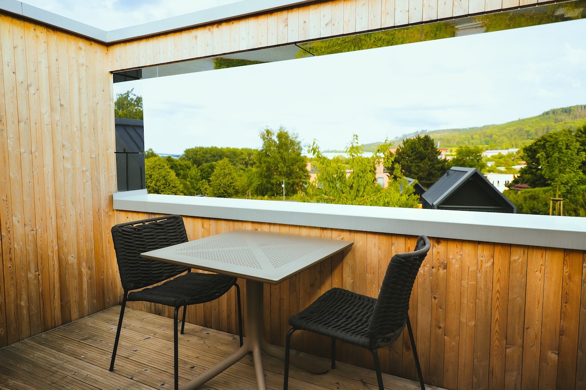 Tiny House mit Schlafzimmer und Dachterrasse