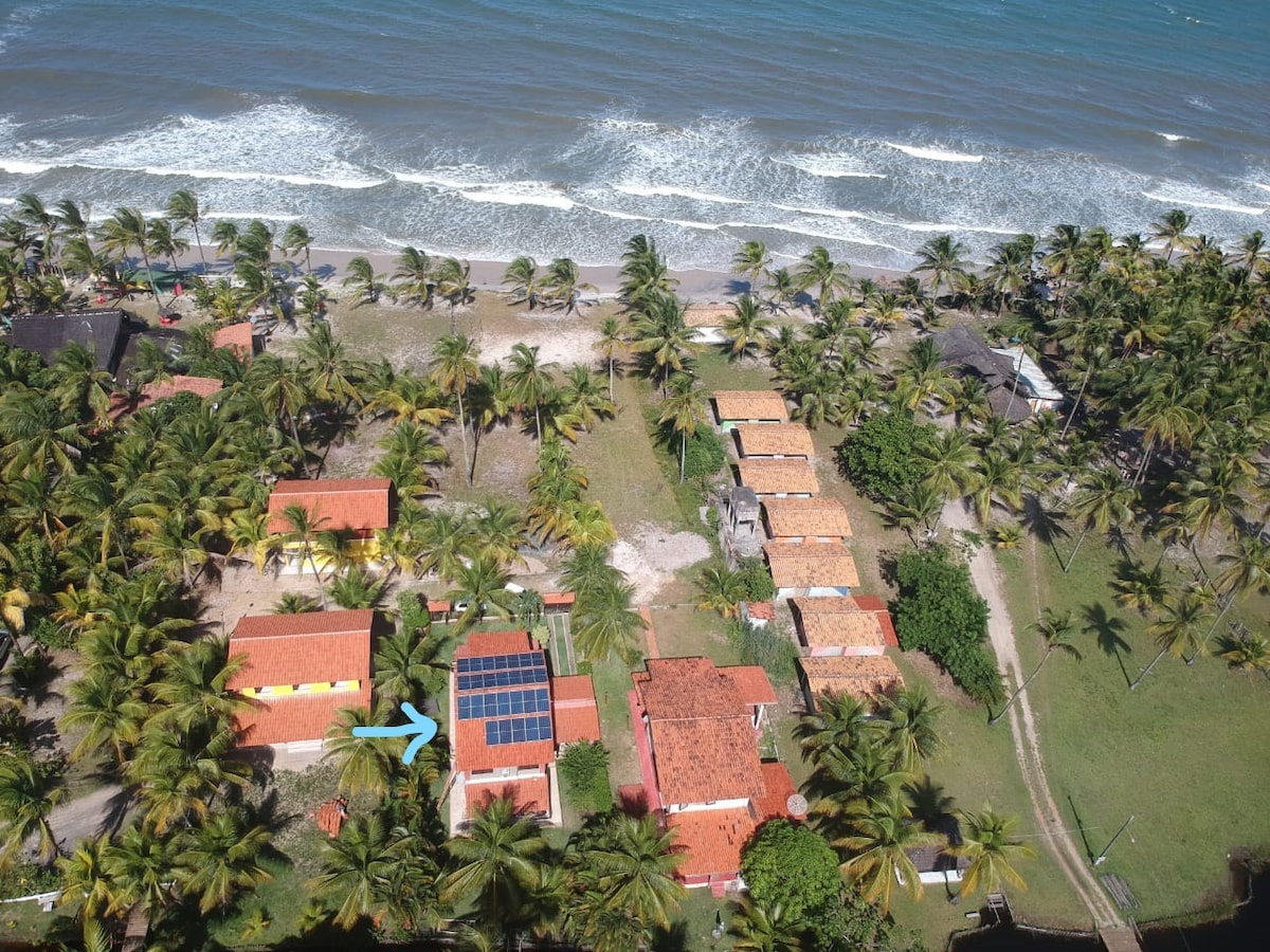 Casa de praia pé na areia: nos braços da natureza.