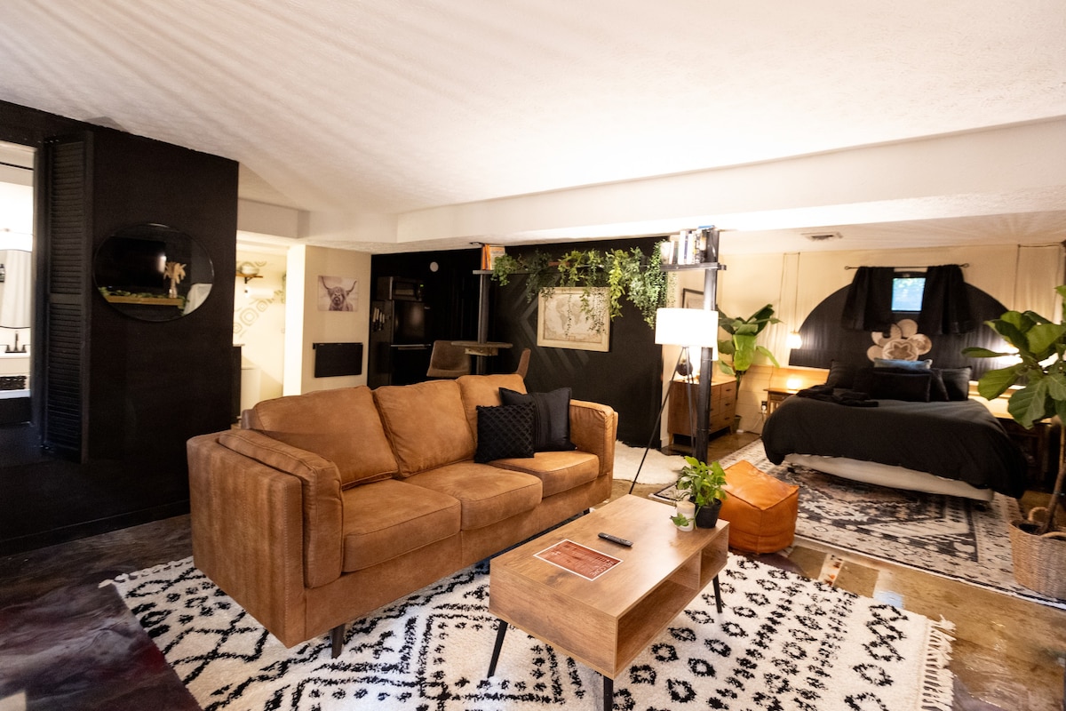 Claw foot tub/fireplace boho apartment