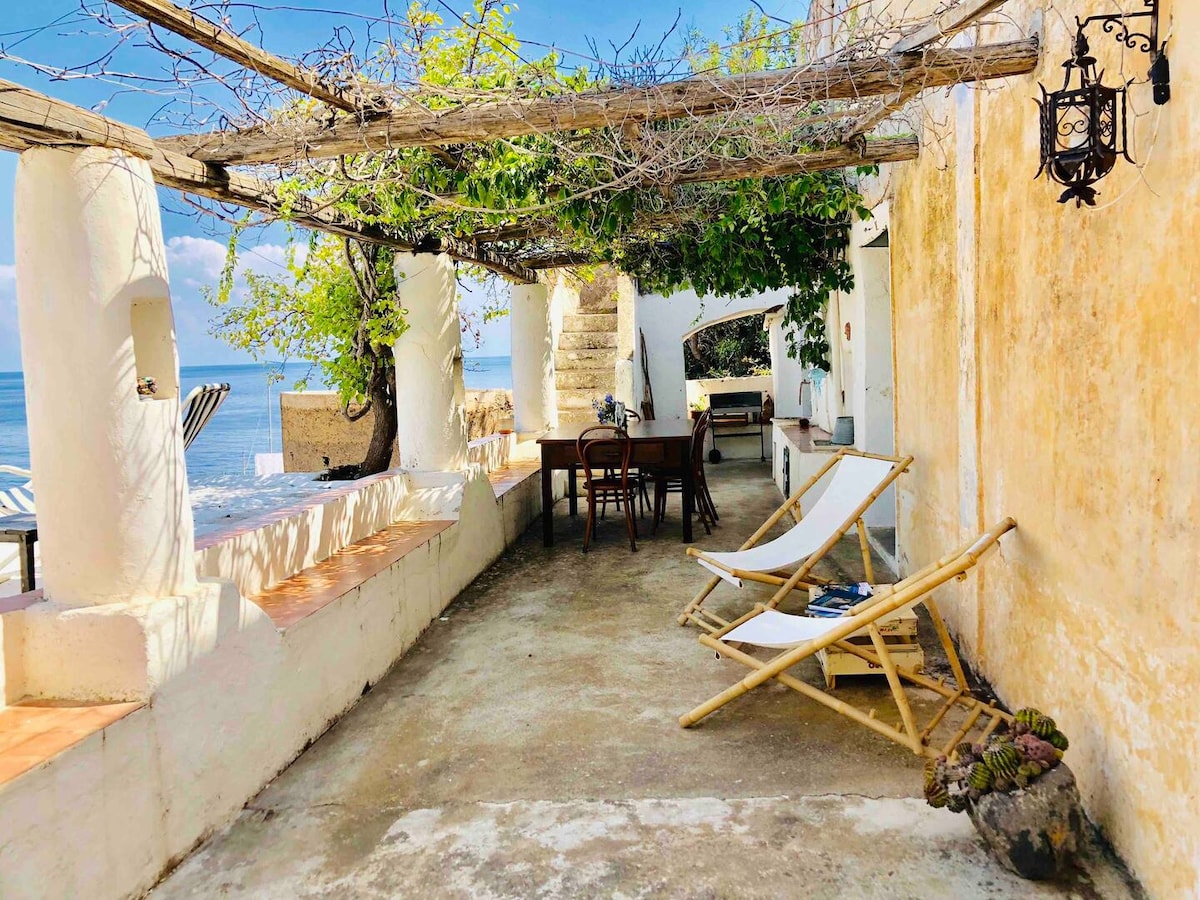 Fisherman's house in front of the sea