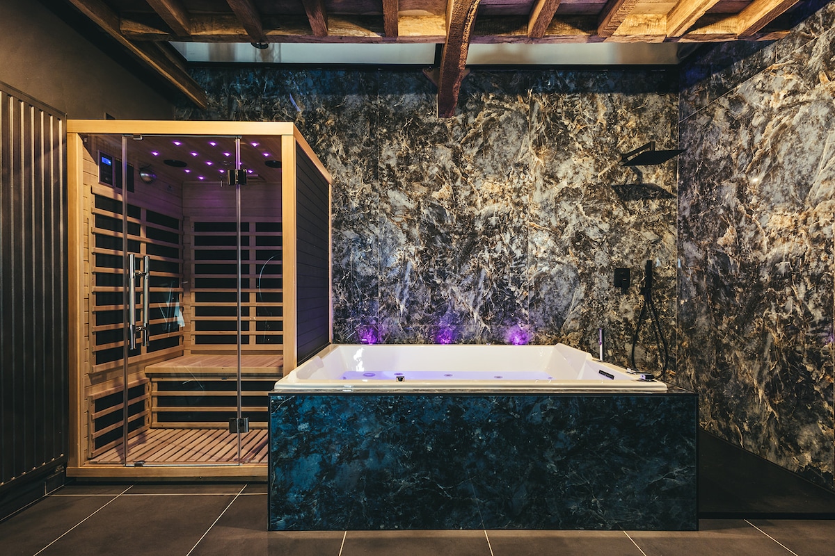 Le Duplex de l'Etoile home cinéma jacuzzi et sauna