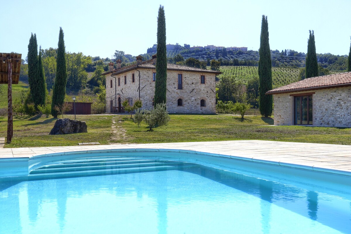 Room in farmhouse with swimming pool.