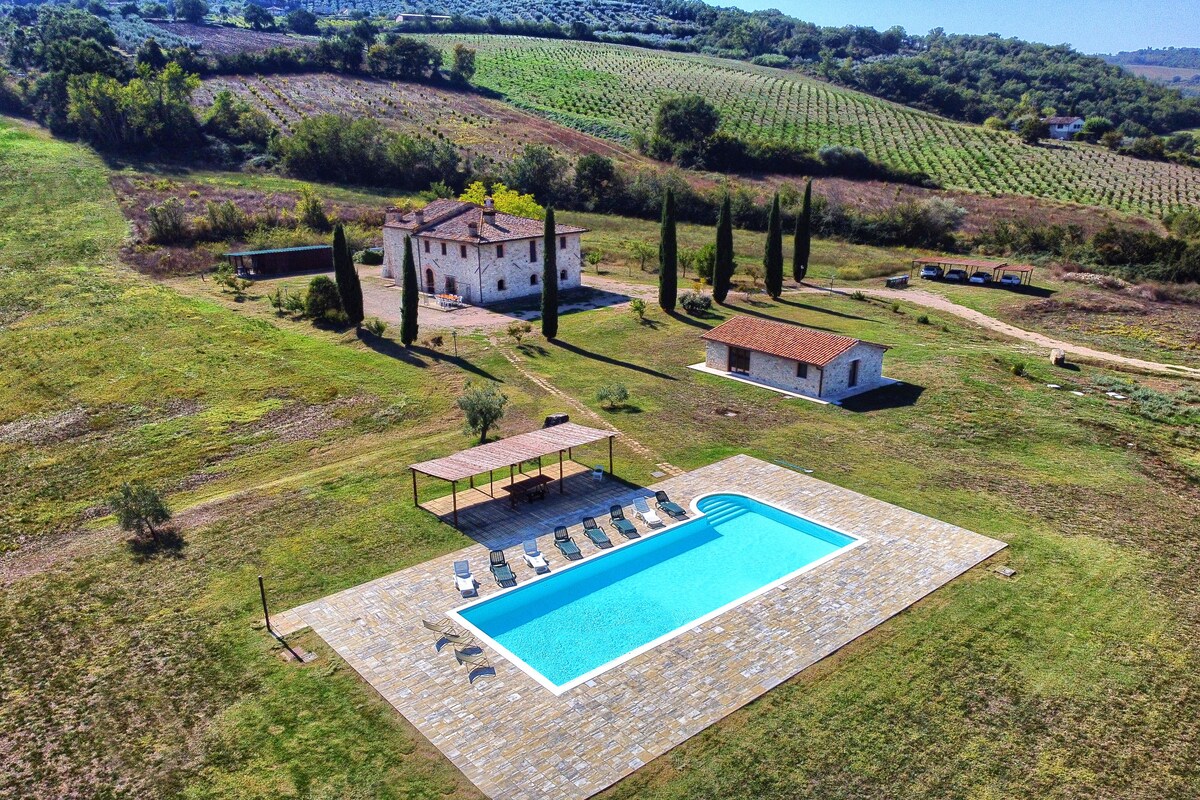 Room in farmhouse with swimming pool.