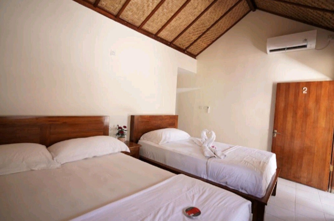房间可容纳3人（ 2张床、热水、无线网络、空调）
