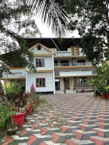 Karunagappalli的民宿