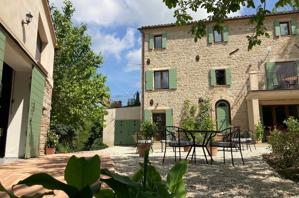 Room in old winery overlooking olive grove.