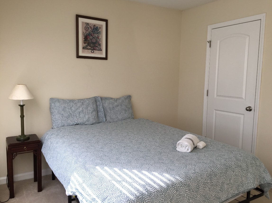 D Bright, comfortable bedroom with Share bathroom