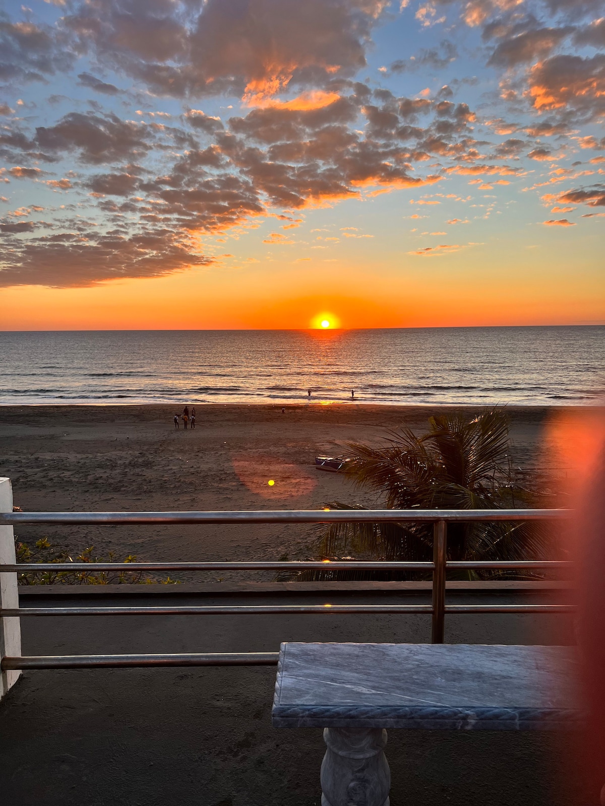 Beach Front! Relax and enjoy the beautiful sunset