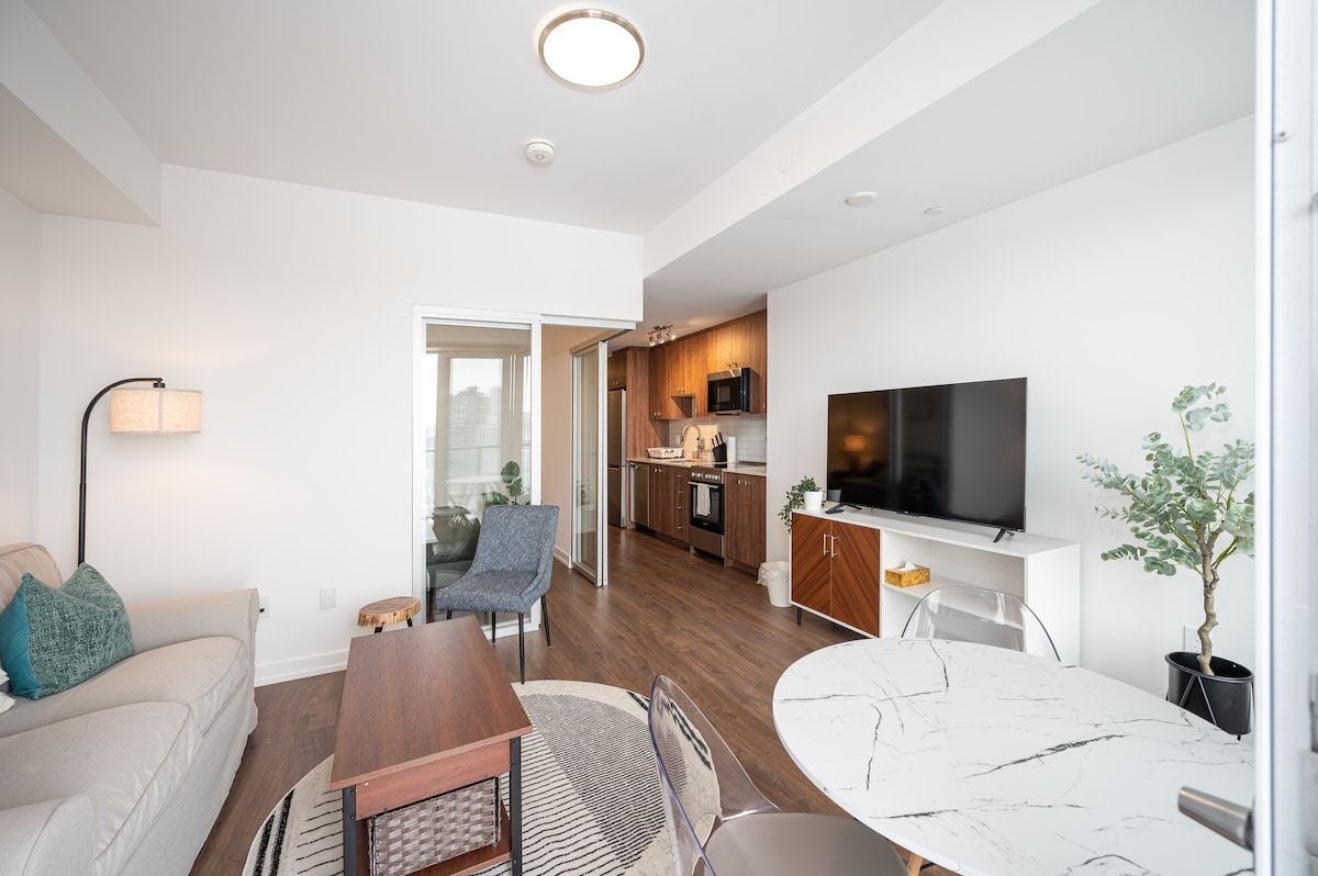 Brand new 1 BR condo steps away from downtown core