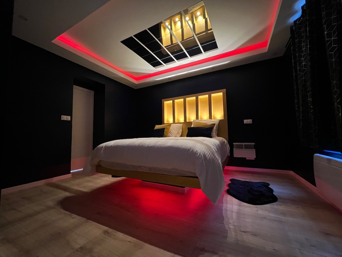 La Suite-Jacuzzi 2 places/salon/cuisine/chambre