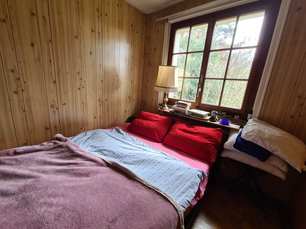 Chambre avec vue sur le jardin