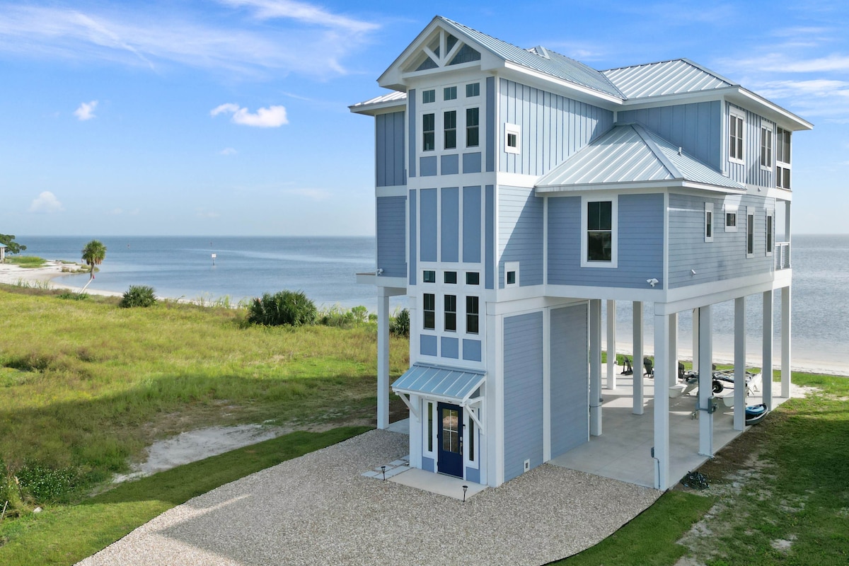 Brand new beach house on the sand, with boat lift