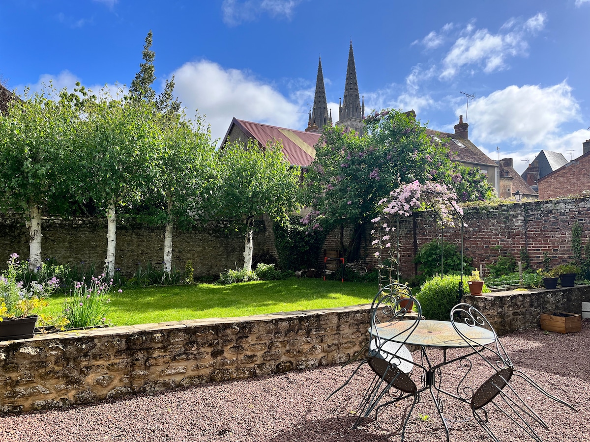 Maison chaleureuse avec jardin et garage