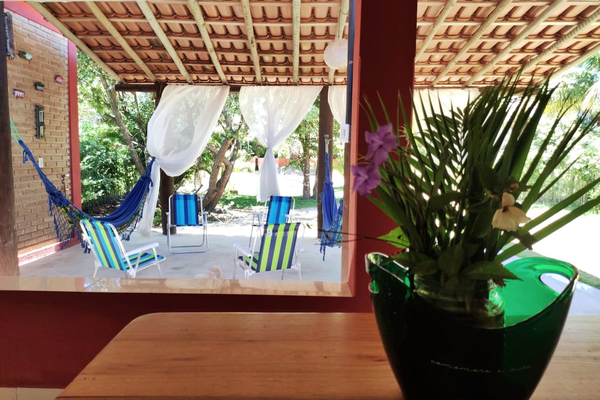 Casa com suíte, ar cond e terreiro em Cumuruxatiba