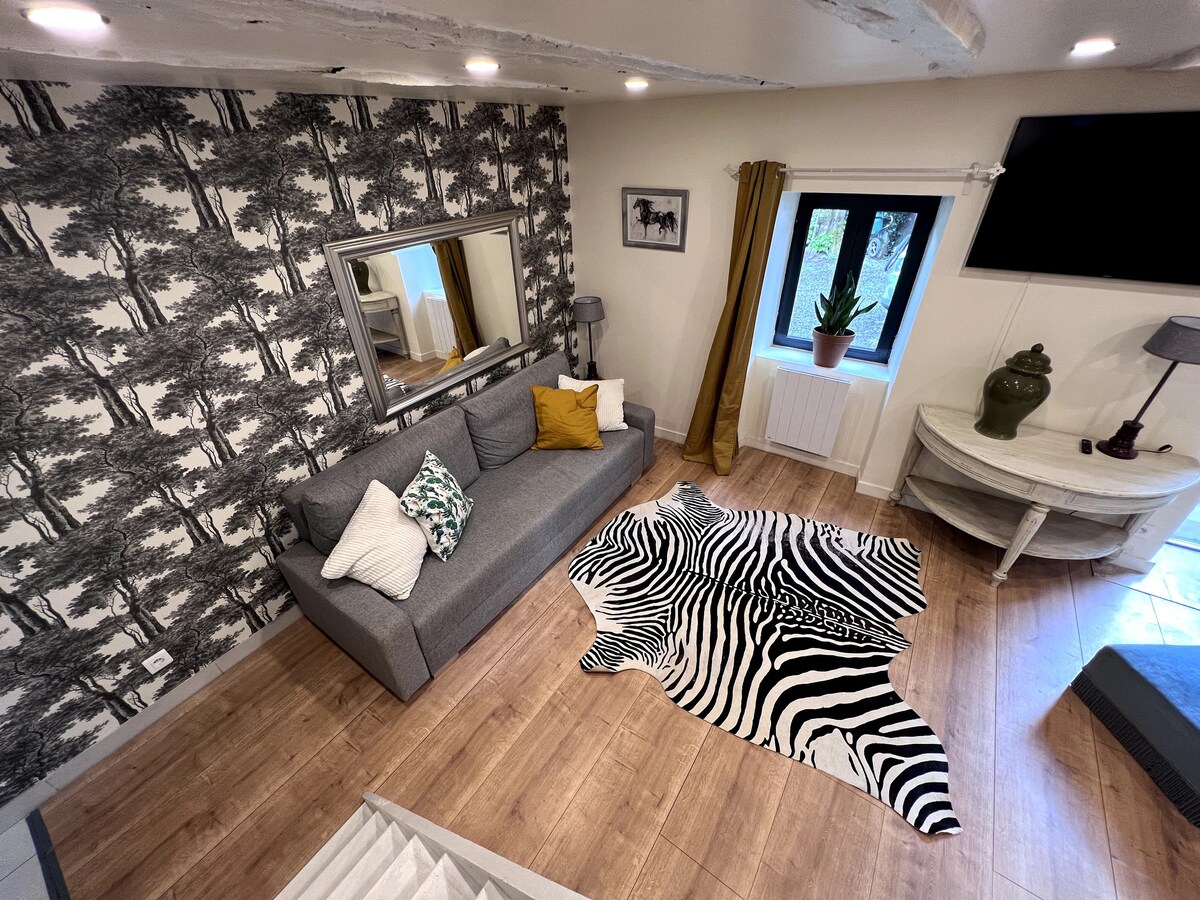 Maison cosy avec étang et wifi