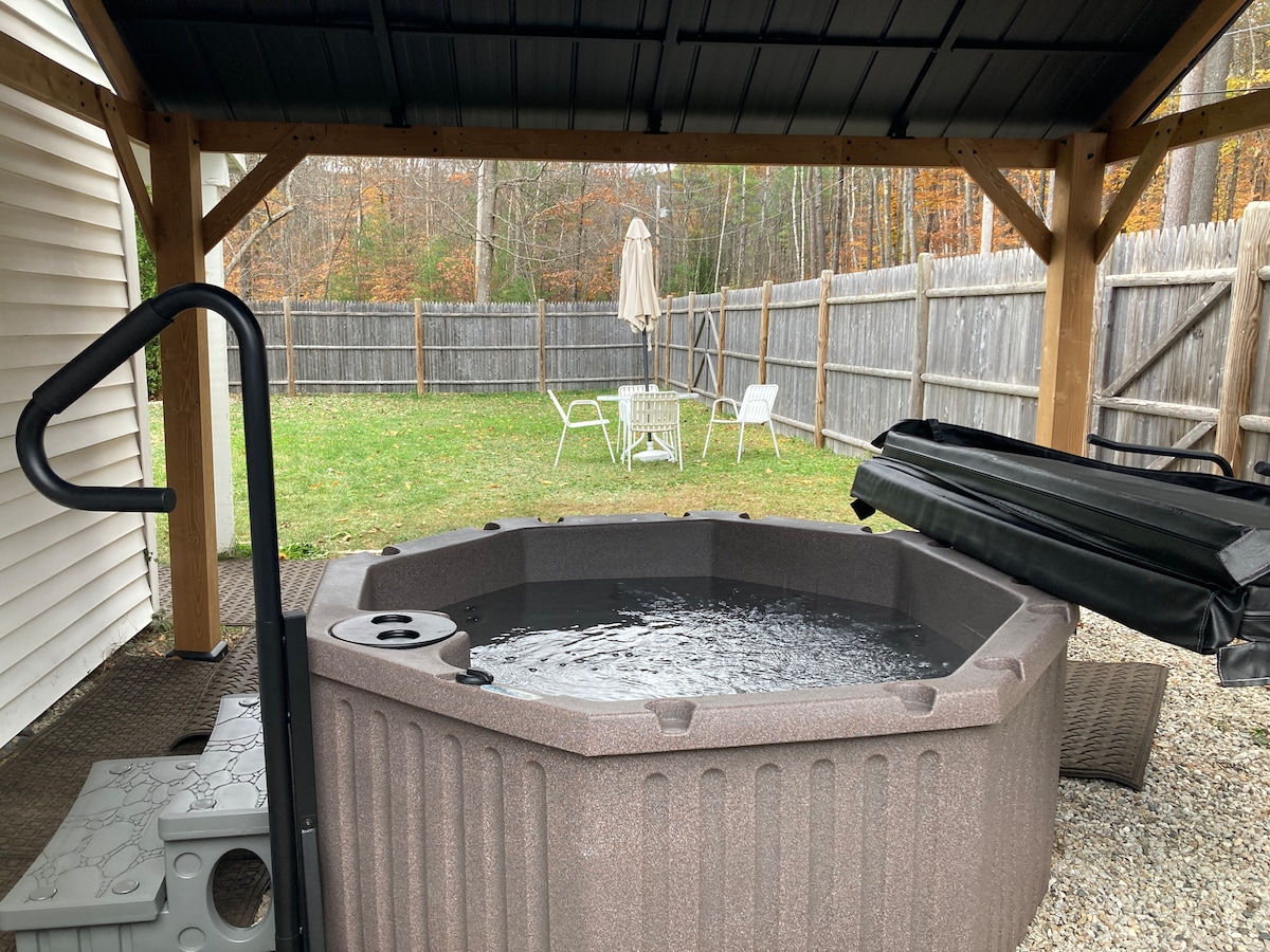 Downtown North Conway with fire pit and hot tub.