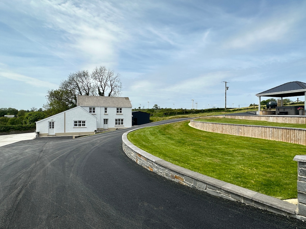 spacious farmhouse with hot tub and gardens