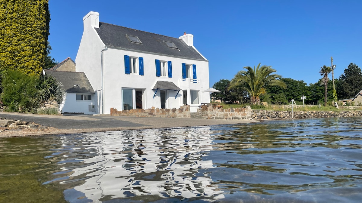 Maison les pieds dans l'eau