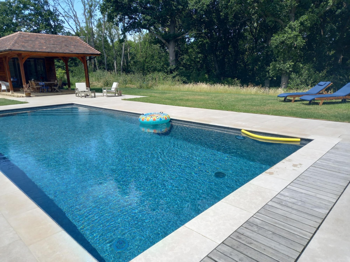 Woodland lodge with heated pool