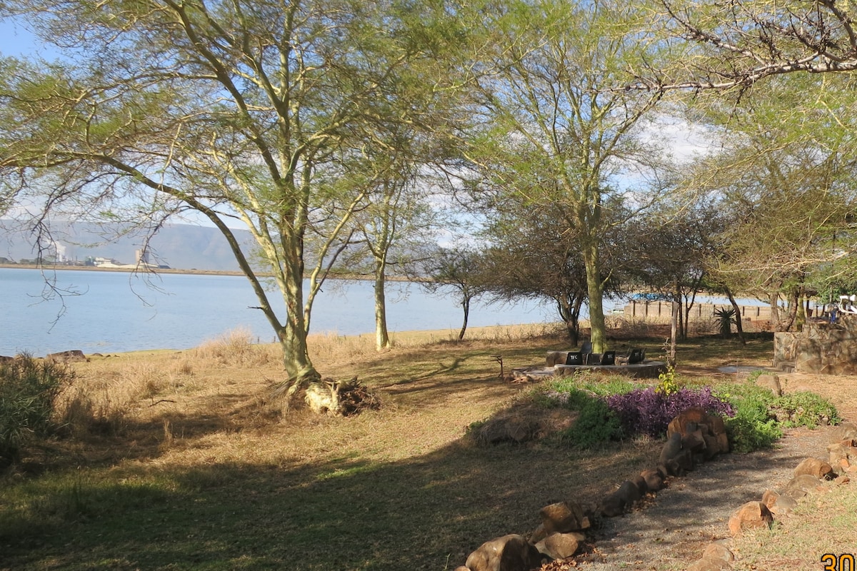 Rustic cabins overlooking a dam