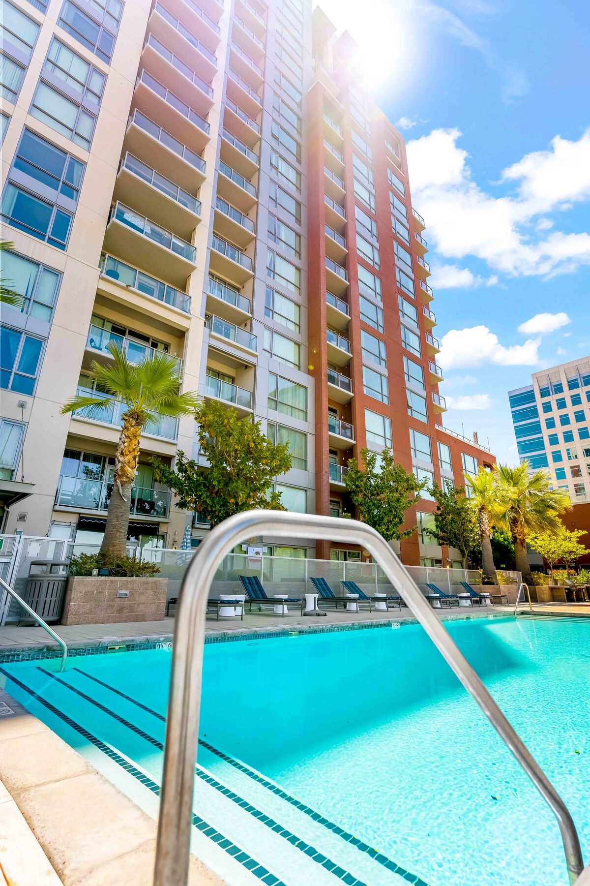 Luxury 1BR Condo w/ Balcony, King Bed, Gym, Pool