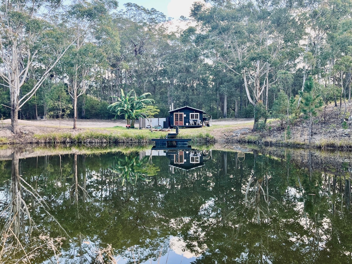 Little Olive Eco Cabin on a dam.