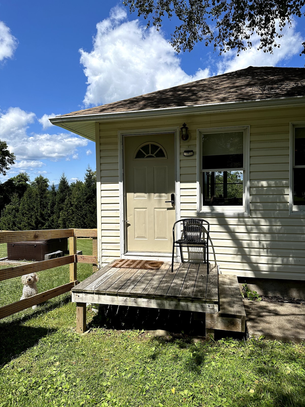 bungalow with a fenced yard next to minnewaska