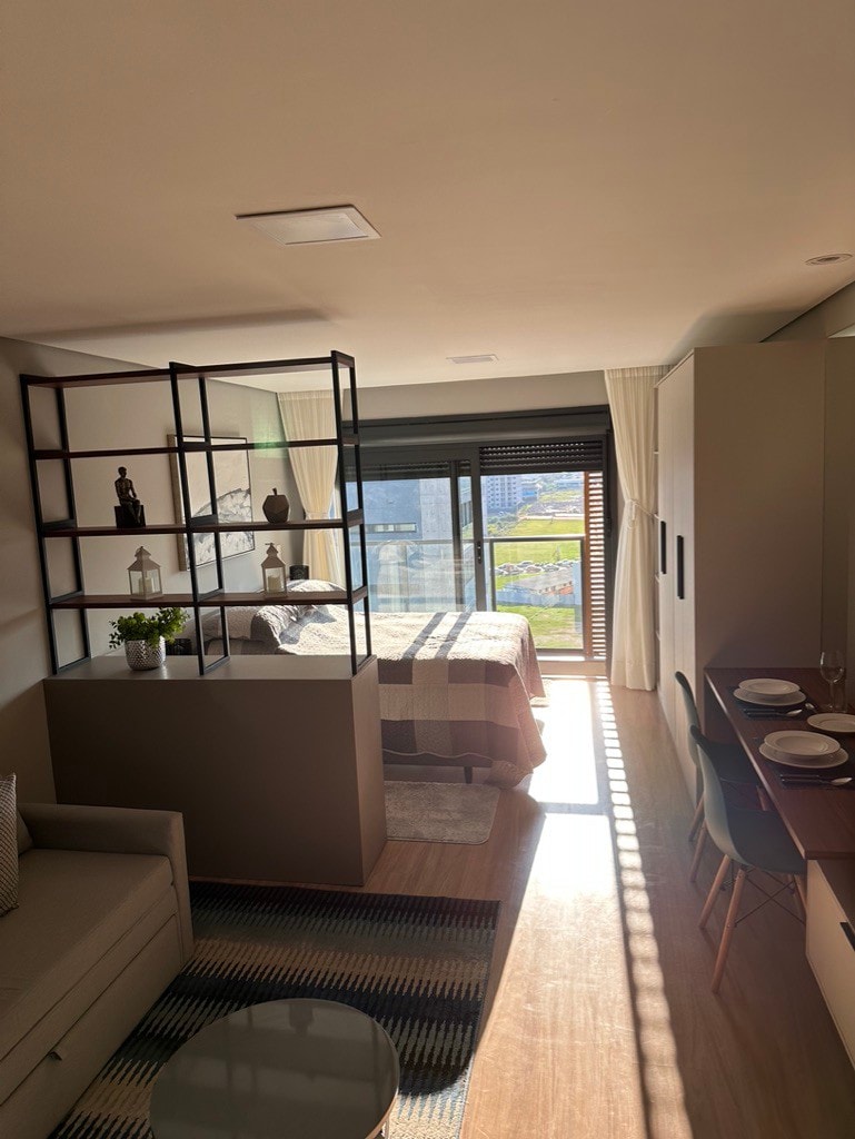 Inn 1009, Loft com Garagem e Sacada no Parque Una