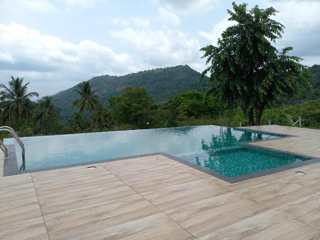 six one cottages with pool Perithalmanna