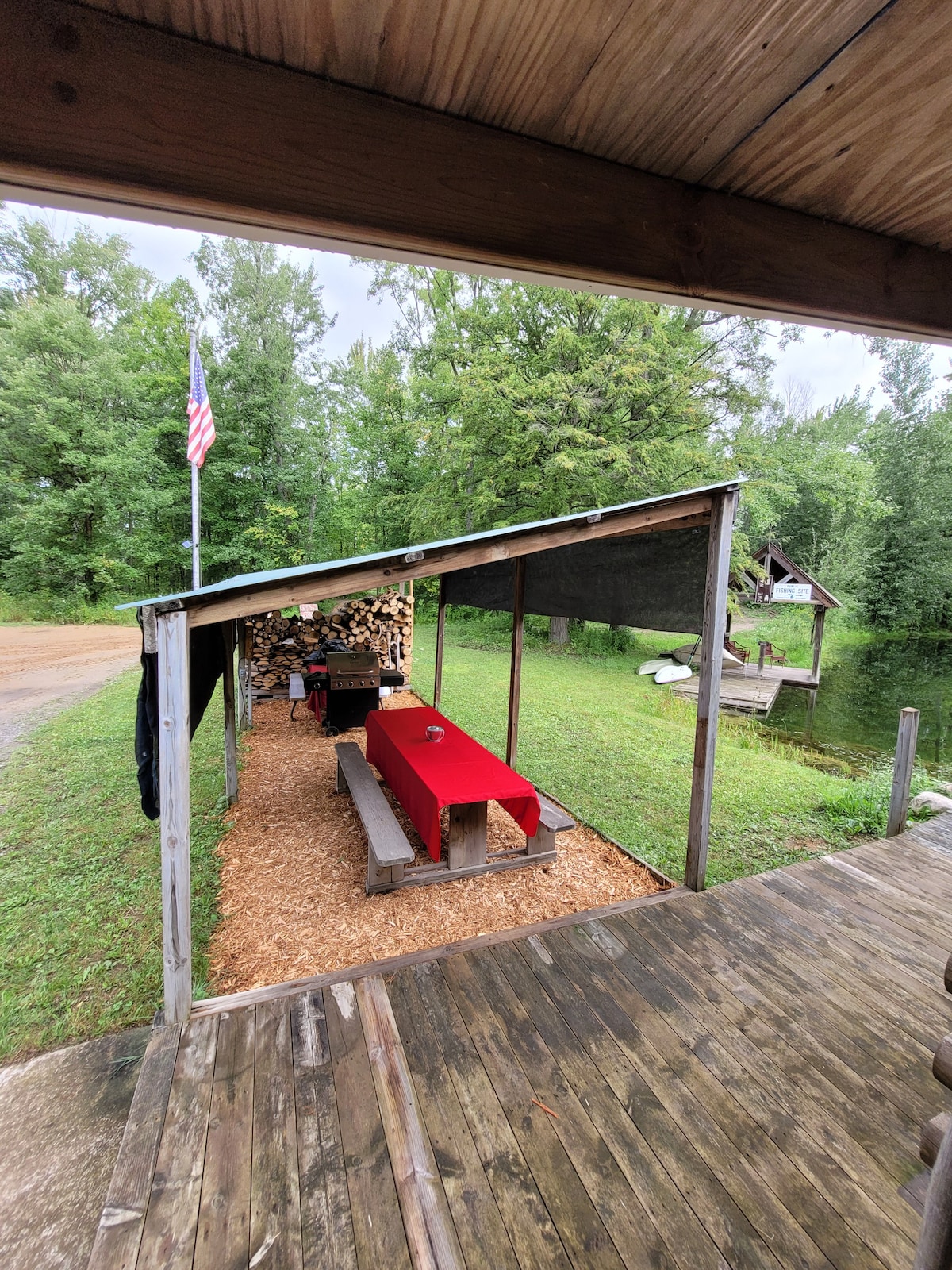 Remote, off-grid cabin w/pond on 120 acres + goats