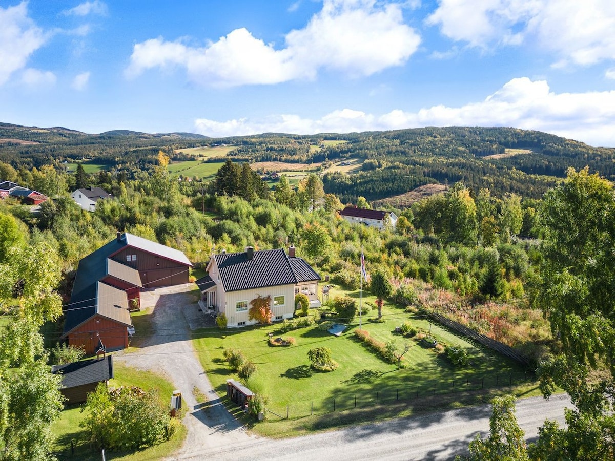 Maison à la campagne avec grand jardin et un chat