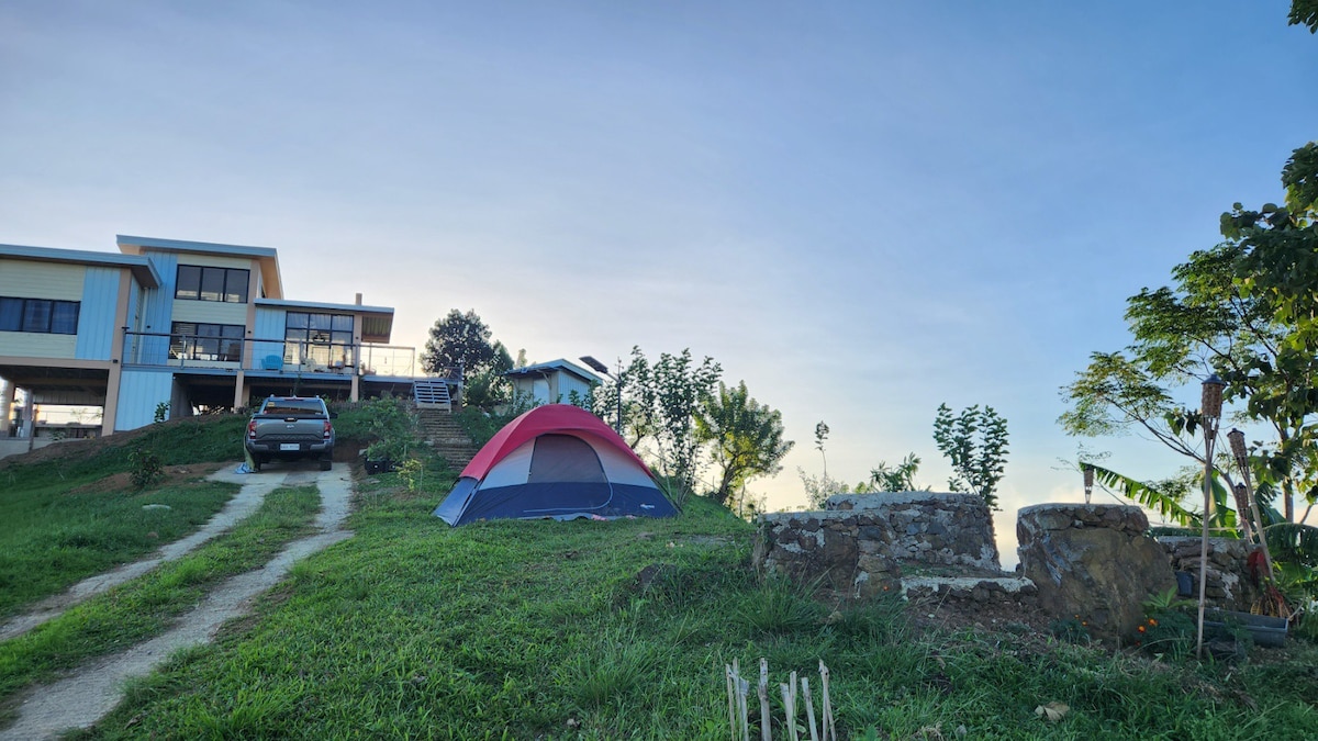 Inn the Mountain, a tiny home on a foggy hill.