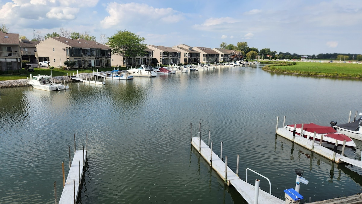 Gorgeous waterfront balcony view with a boat dock