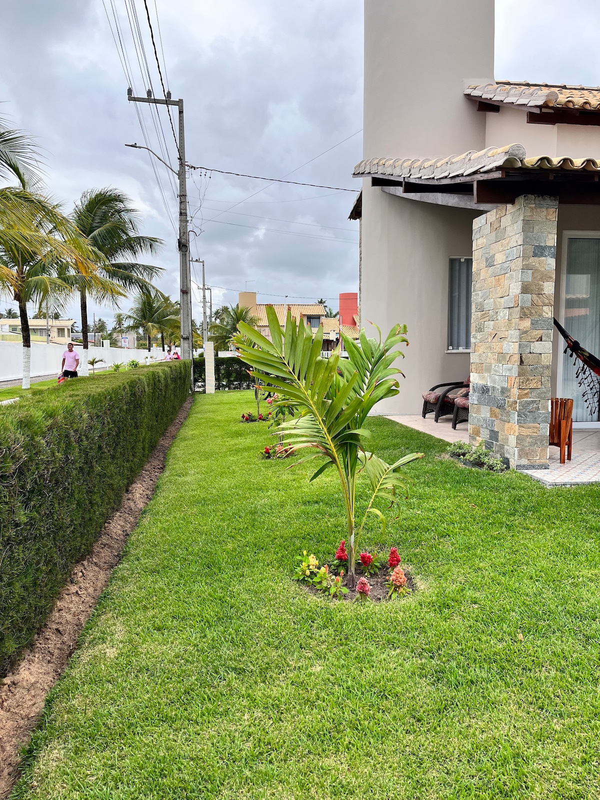 Casa de praia aconchegante condomínio a beira mar.