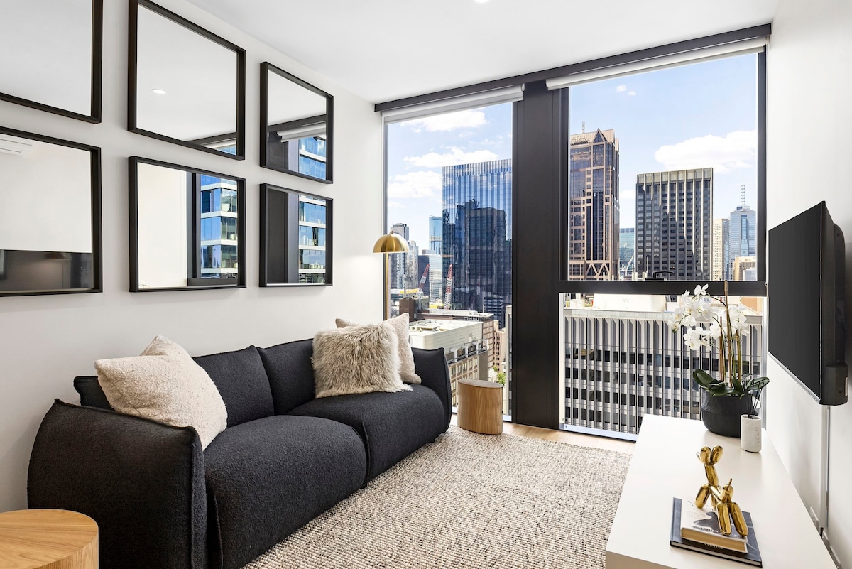 Modern Collins St Apartment with City Views + Gym