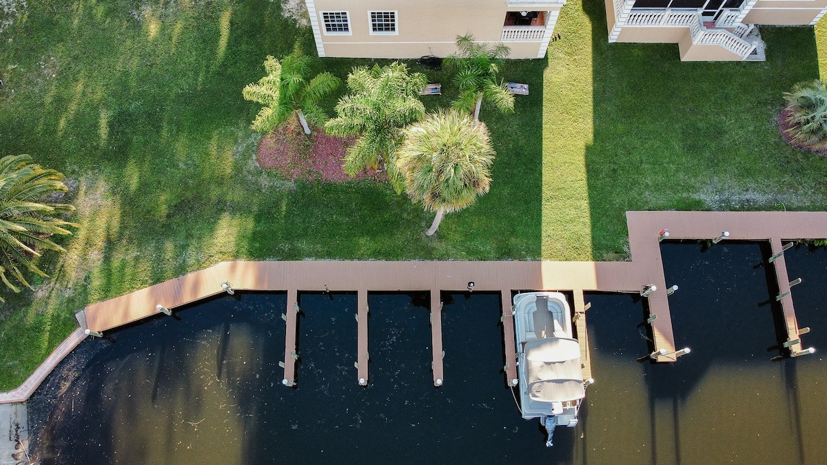 Canal home, boat ramp, dock, trailer parking, golf