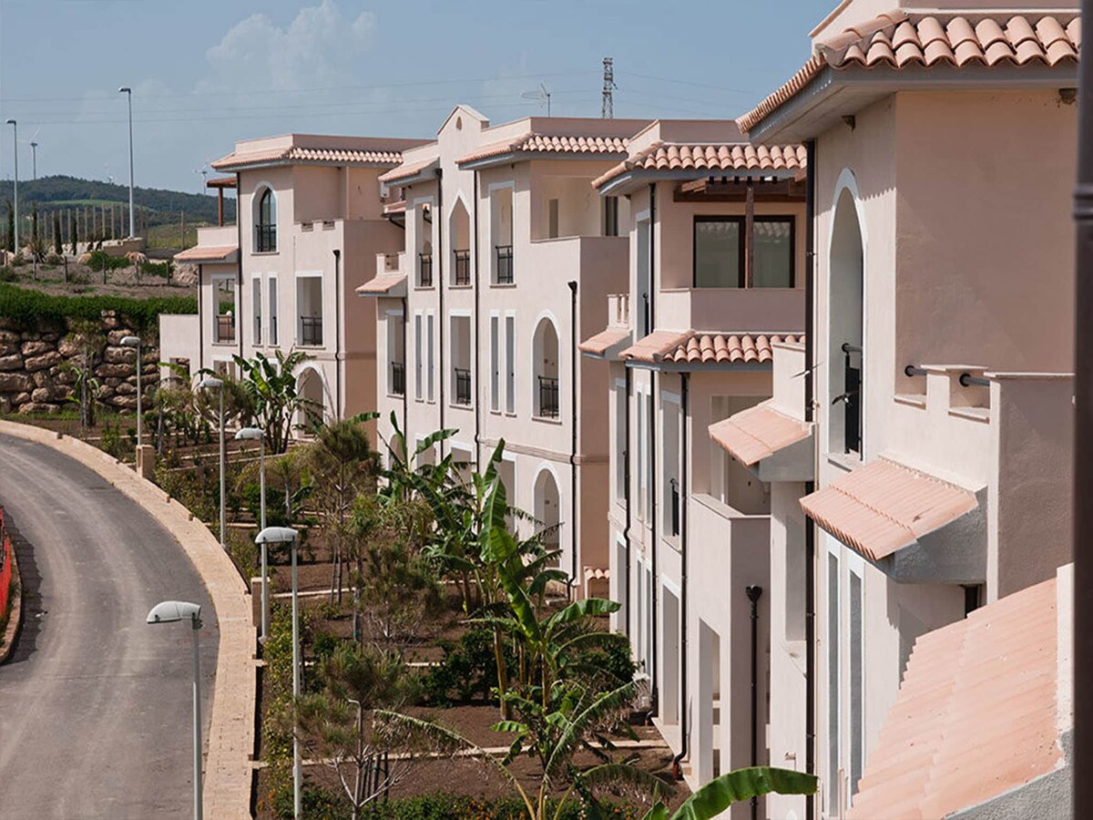 Apartment with garden in resort with pool