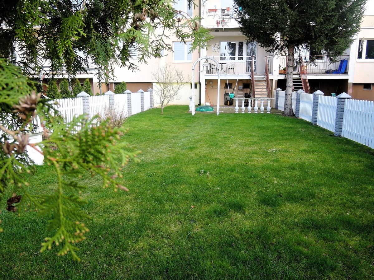 Large holiday apartment with a garden in Stepnica