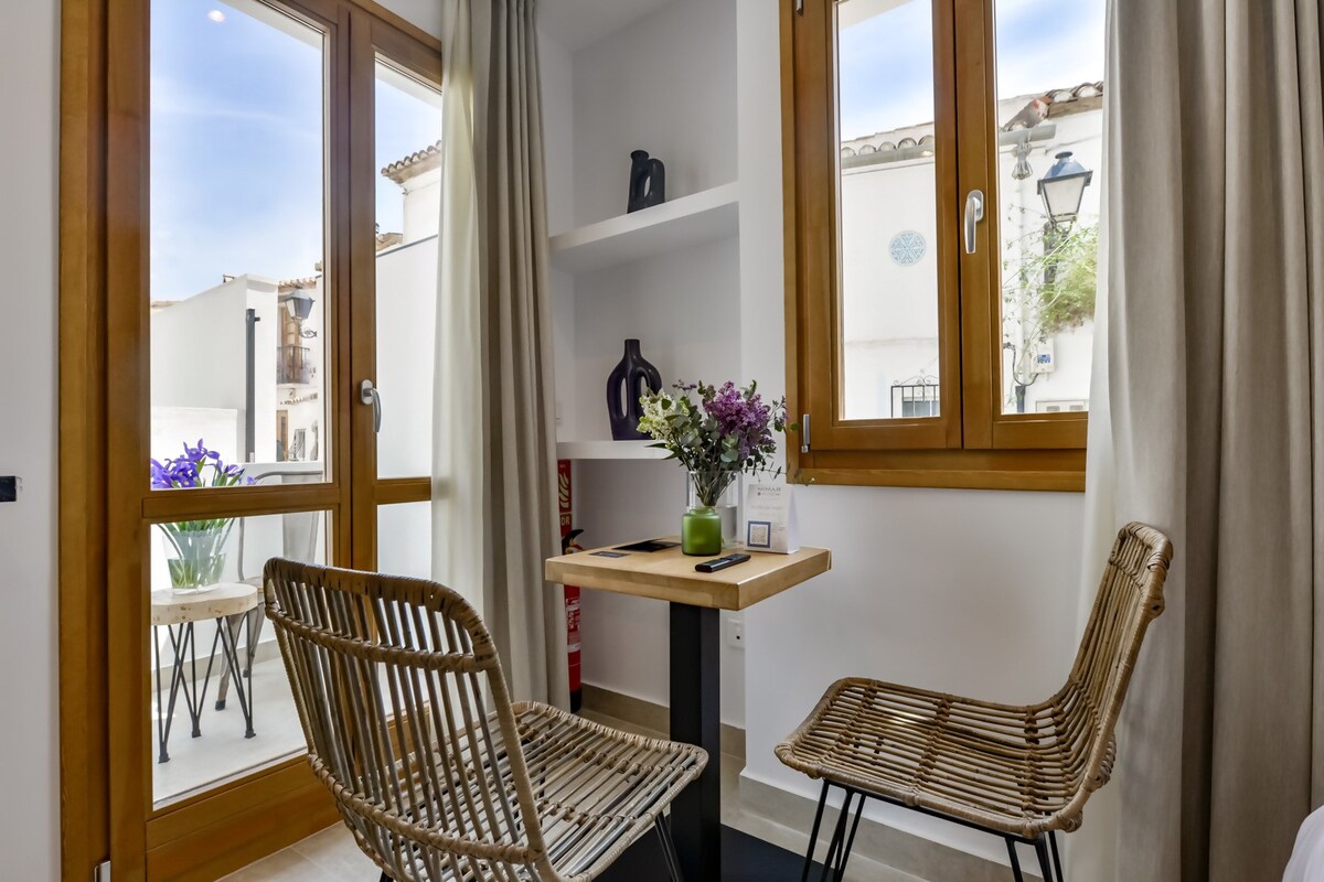 Room with access to common patio and pool