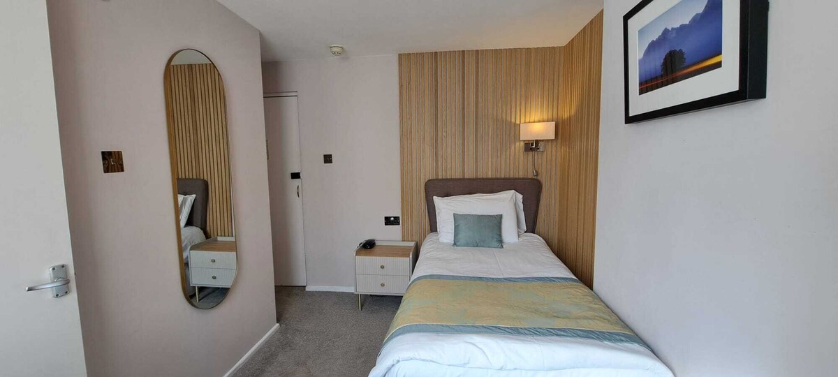 Standard single en-suite room with one single bed