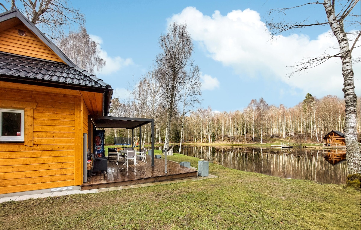 Beautiful home in Bjärnum with lake view