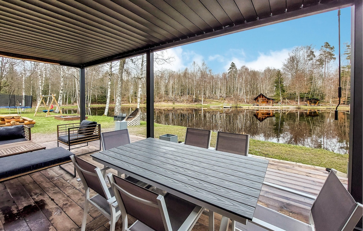 Beautiful home in Bjärnum with lake view
