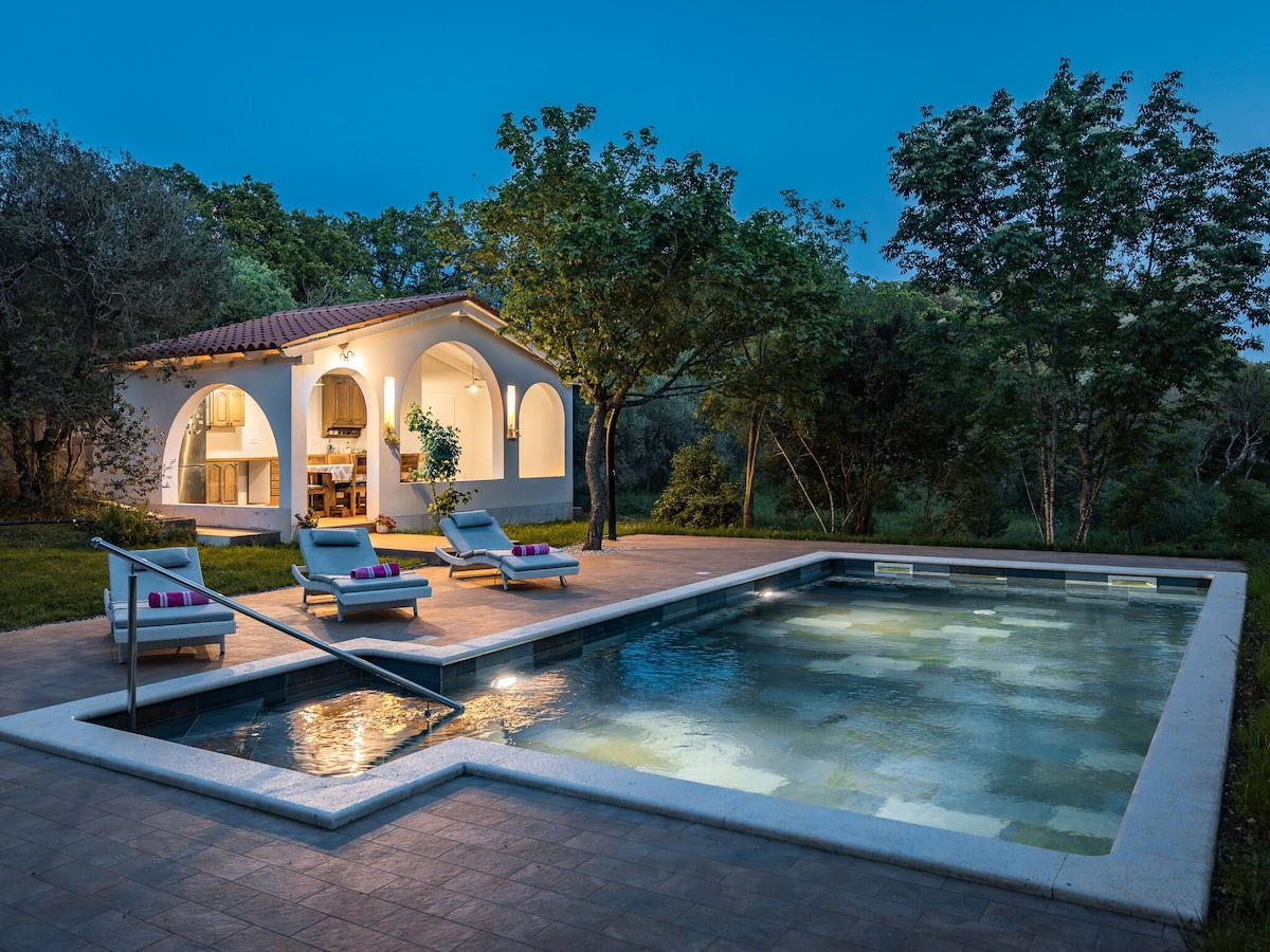 Beautiful villa with a pool and a fenced garden