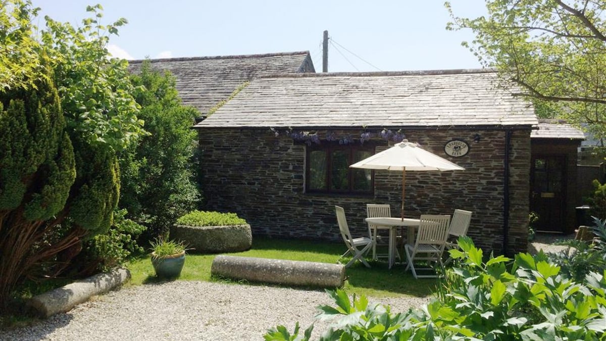 Treveglos Barn, a semi-detached barn conversion set to one side of the road from Newquay to Padstow