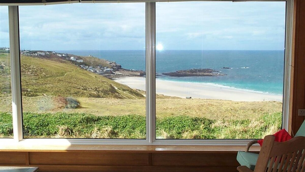 Sennen Cottage, a spacious older style bungalow with panoramic views over Sennen Cove