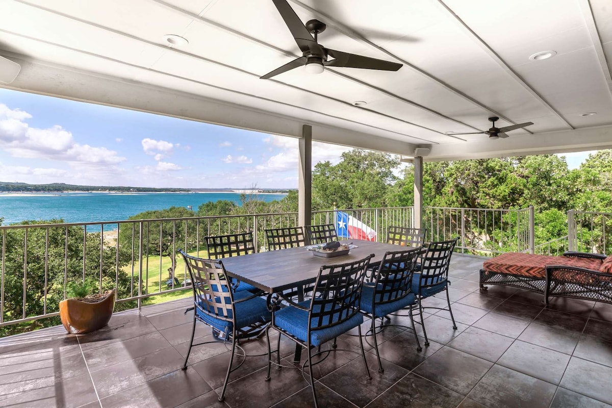 Lakefront Home with sand volleyball court by water